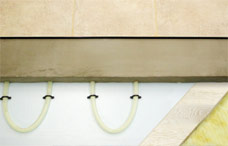 Roth Radiant Panel installation with PEX tubing is stapled onto wood sub floor